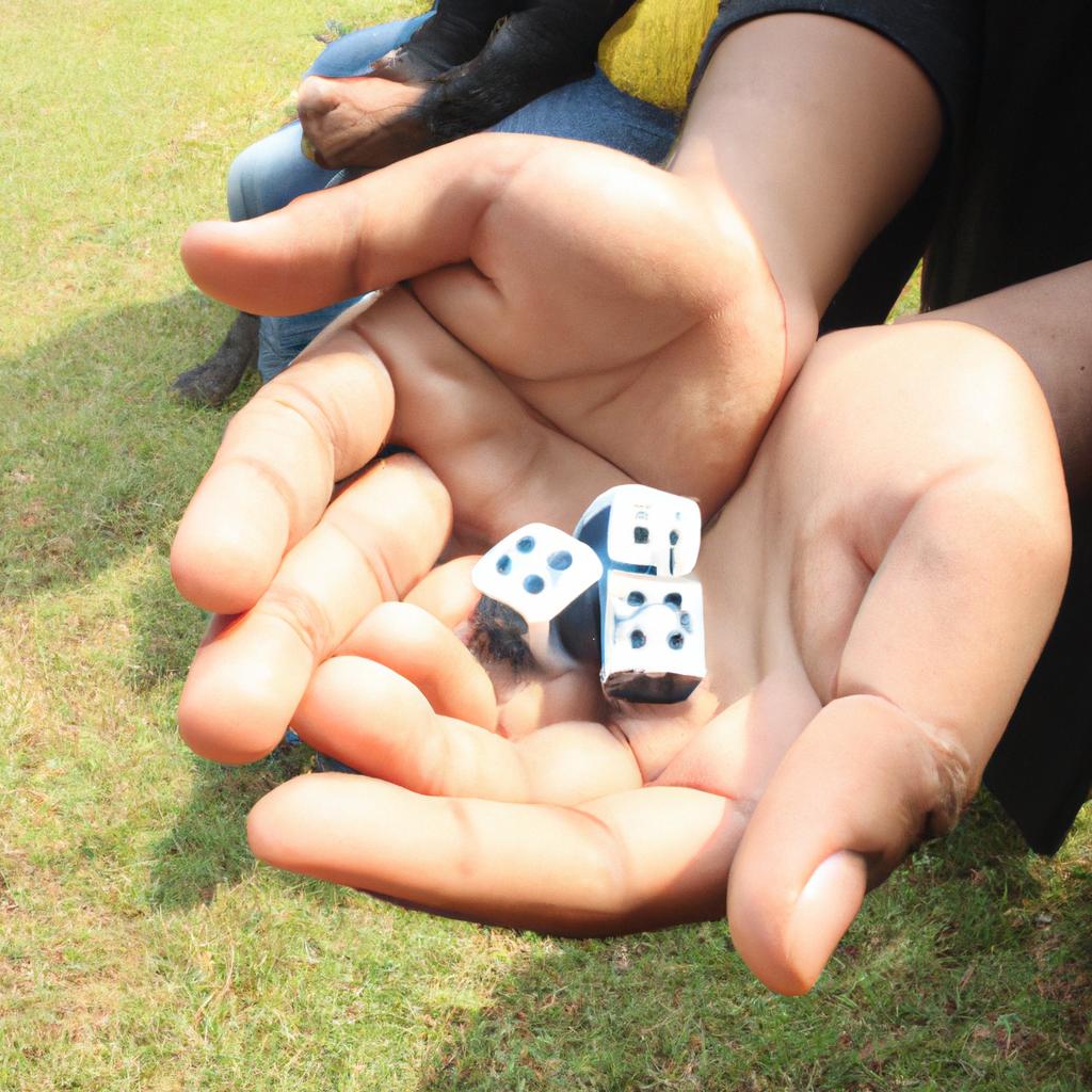 Person holding dice, game board